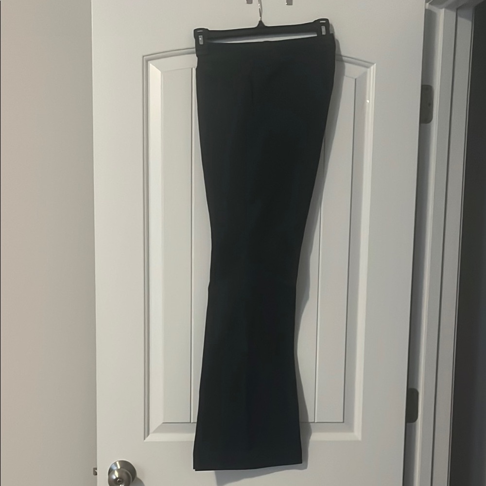 Chic grayTrousers for women. 2 front pockets, and two fake back pockets.